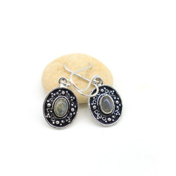 Boucle d'oreille...