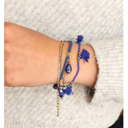 Bracelet bleu à pompons...