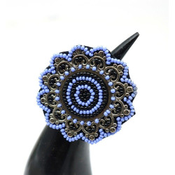 Bague en perles fleur -...