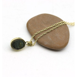 Pendentif pierre noire et...