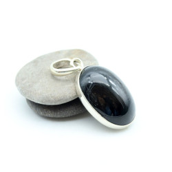 Pendentif pierre noire en...
