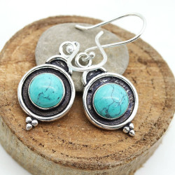 Boucle d'oreille turquoise...