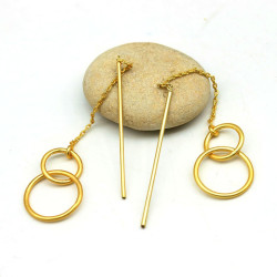 boucle d'oreille dorée à...