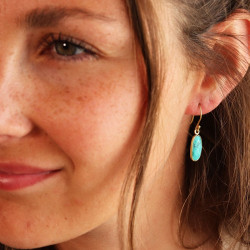Boucle d'oreille turquoise...