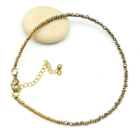 chevillère perles grises et dorées
