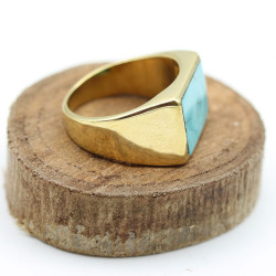 Bague dorée et turquoise...
