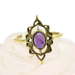 Bague dorée pierre violette...