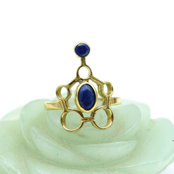 Bague dorée pierres bleues...