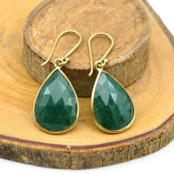 Boucle d'oreille pierre...