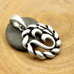 Pendentif Aum rond en...