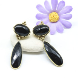 Boucle d'oreille pierre...