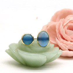 Bague dorée pierres bleues...