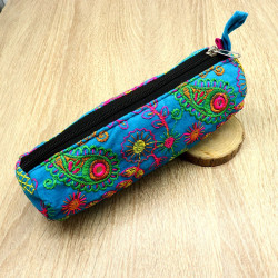 Trousse turquoise en tissus...