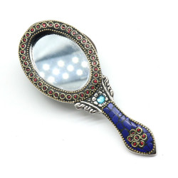 Miroir de poche bleu et rouge