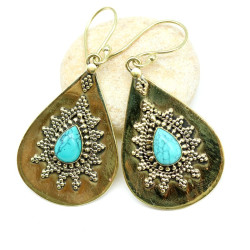 Boucles d'oreille dorées et...