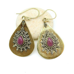 Boucles d'oreille dorées et...