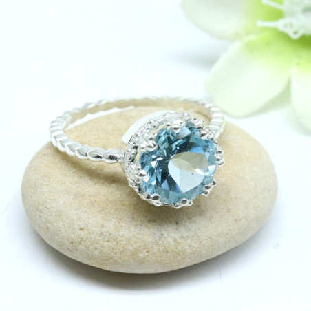 Bague argent griffée pierre topaze bleue