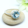 Bague argent griffée pierre topaze bleue