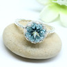 Bague argent griffée pierre topaze bleue