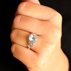 Bague pierre topaze bleue...