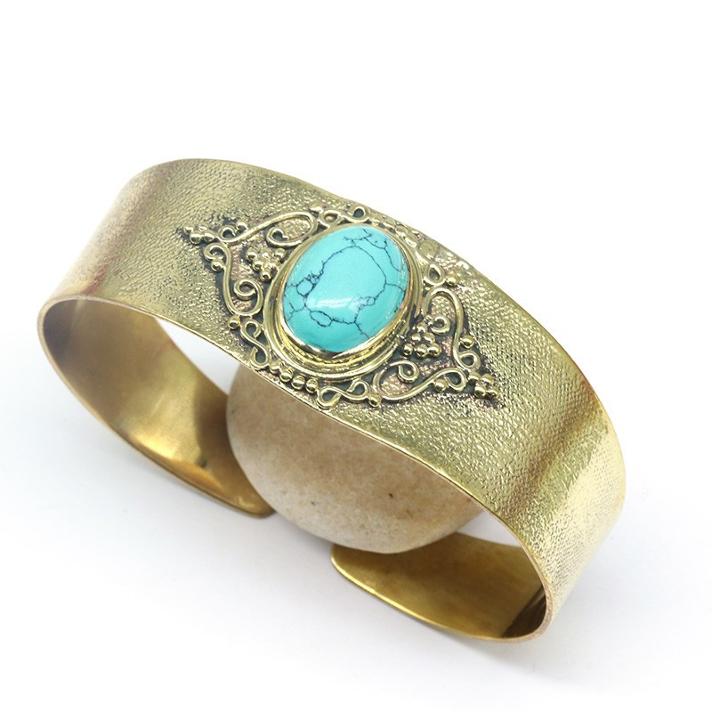 Manchette dorée et pierre turquoise Manchette dorée et pierre turquoise