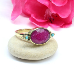 Bague dorée pierre rubis...