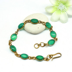 Bracelet doré et pierres...