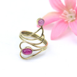 Bague dorée allongée et...