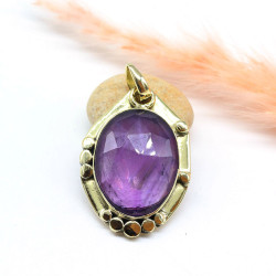 Pendentif doré et améthyste...