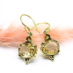Boucles d'oreilles dorées...