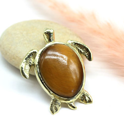 Pendentif doré tortue...