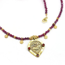 Collier rubis facetté et...